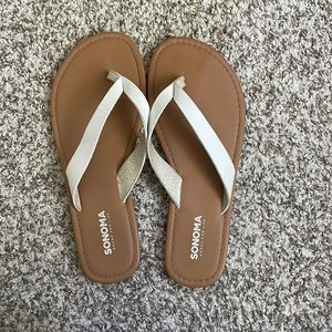 Sonoma white and tan flip flops. Size 6.